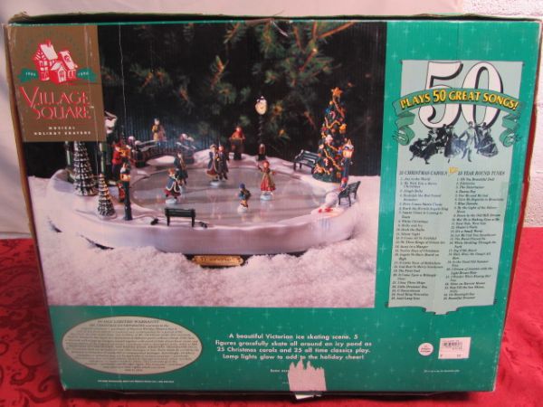 HOLIDAY VILLAGE SQUARE MUSICAL ICE RINK WITH SKATERS.  PLAYS 50 SONGS!