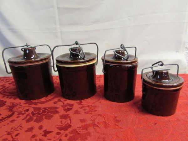 A LOVELY ASSORTMENT OF CANISTERS OF ALL SIZES . . . GLASS, CERAMIC & PLASTIC & A BEAUTIFUL PLATTER