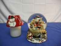 A SPECTACULAR MUSICAL SNOW GLOBE W/CANDLE