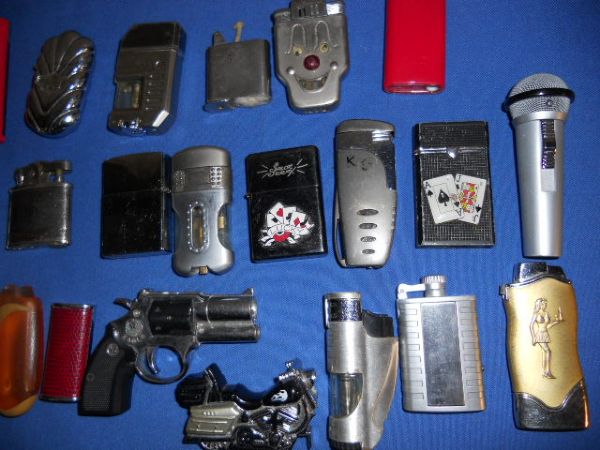 A LARGE COLLECTION OF LIGHTERS
