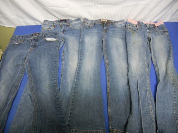 FOUR PAIR OF YOUNG MISS DESIGNER JEANS 