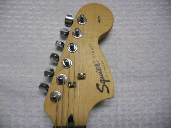 A REALLY COOL SQUIER BY FENDER GUITAR ***THIS ITEM HAS A RESERVE***