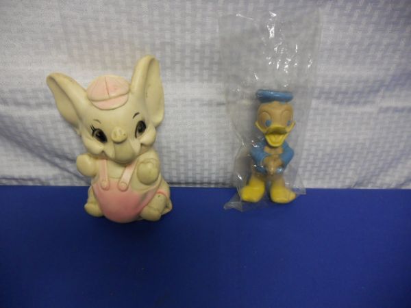 TWO VINTAGE RUBBER FIGURINES 