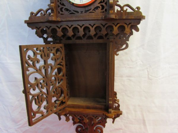BEAUTIFUL ORNATELY CARVED WOOD WALL CLOCK WITH QUARTZ MOVEMENT