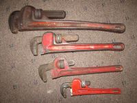 FOUR HANDY PIPE WRENCHES