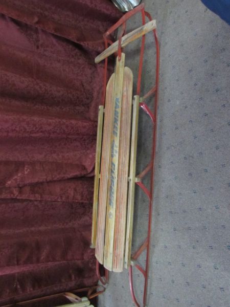2 VINTAGE SNOW SLEDS.  ONE FLEXIBLE FLYER AND ONE UNMARKED SLED