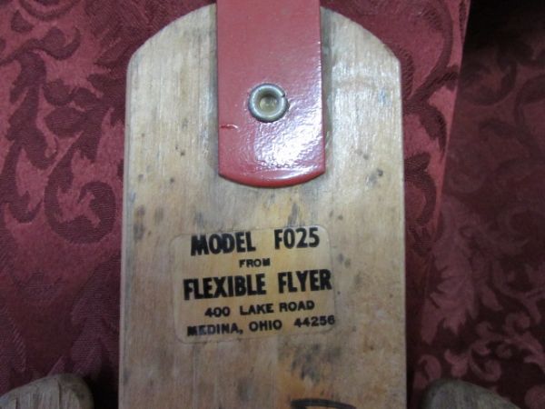 2 VINTAGE SNOW SLEDS.  ONE FLEXIBLE FLYER AND ONE UNMARKED SLED