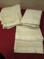 TWO FLAT SHEETS WITH HANDMADE LACE, ONE SET OF MATCHING PILLOWCASES