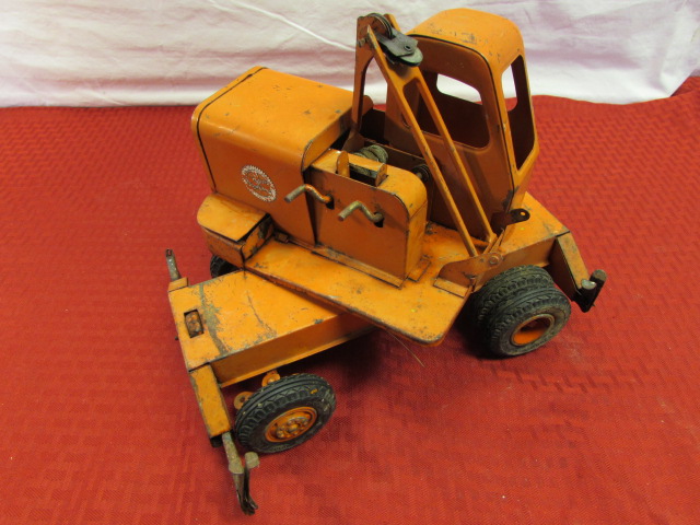 antique metal toy crane