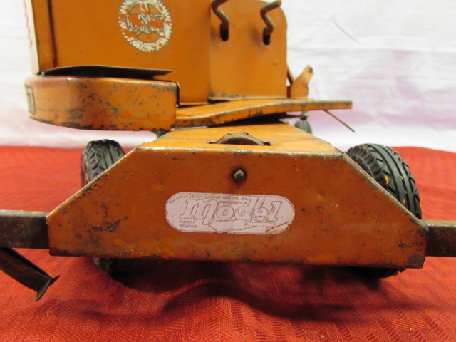 antique metal toy crane