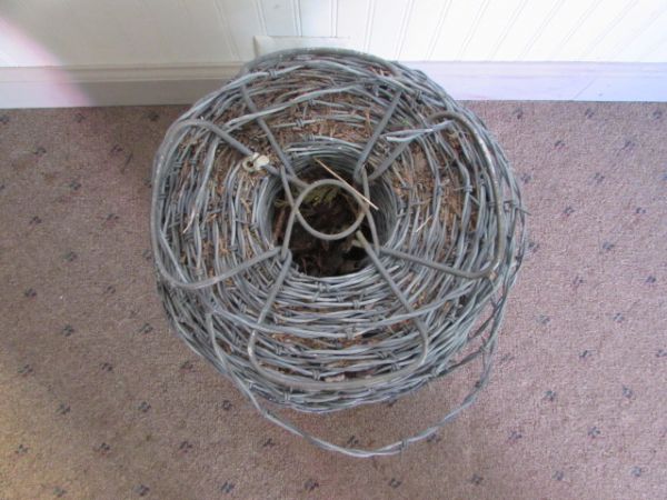 LARGE SPOOL OF BARBED WIRE