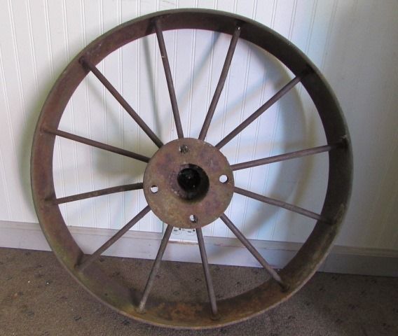 ANTIQUE METAL WAGON WHEEL WITH 4 WIDE RIM