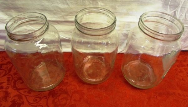 VINTAGE GLASS JARS & MORE - THREE WIDE MOUTH GALLON JARS, A GALLON JUG, A BALL JAR & A VINTAGE WINE BOTTLE
