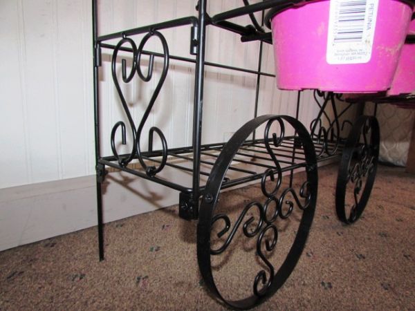 WROUGHT IRON PLANT STAND WITH SIX PLASTIC STARTER POTS