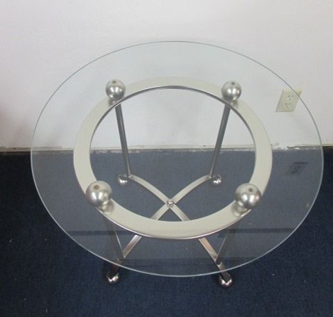 PRETTY ROUND GLASS SIDE TABLE WITH BRUSHED CHROME & A PORCELAIN FIGURINE 