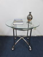 MATCHING  GLASS END TABLE WITH A NOVEL & A HANDMADE VASE