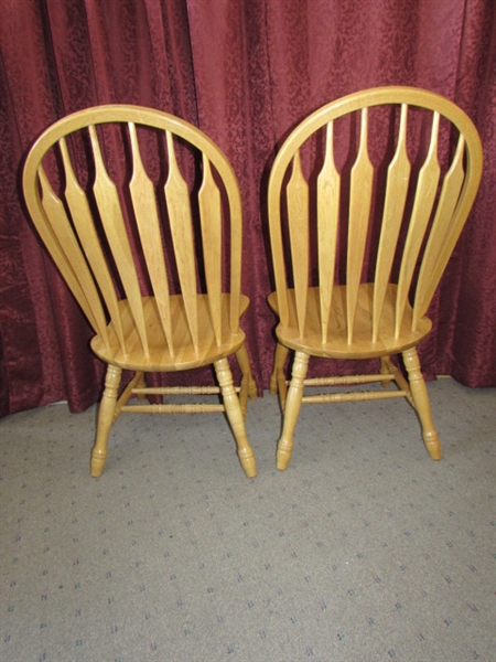TWO MATCHING OAK ARROW BACK DINING CHAIRS 