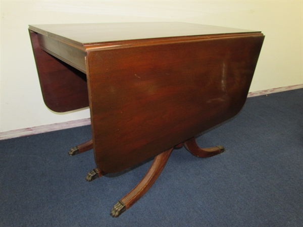 ANTIQUE DROP LEAF TABLE WITH TRIPLE PEDESTAL BASE, CLAW CAPPED FEET, 3 ADDITIONAL LEAFS & TABLE PROTECTOR PADS 