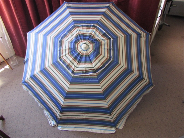 BEACH UMBRELLA!  NICE LARGE UMBRELLA WITH STAKE POLE TO KEEP YOU SHADED IN THE SAND!