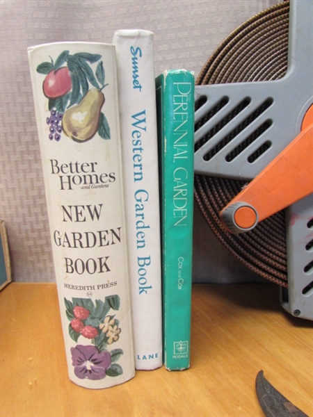 KEEP THE PLACE NEAT WITH COMPACT ROLL AWAY HOSE, AN ASSORTMENT OF GARDENING BOOKS & MORE