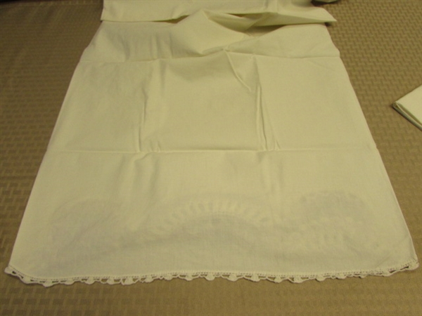 TWO NEVER USED PILLOW CASES WITH EXPERTLY DONE CROCHET LACE DETAILS