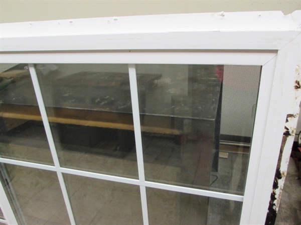 COOL IN THE SUMMER, WARM IN THE WINTER!  BIG VINYL SLIDER WINDOW FOR BETTER ENERGY EFFICIENCY