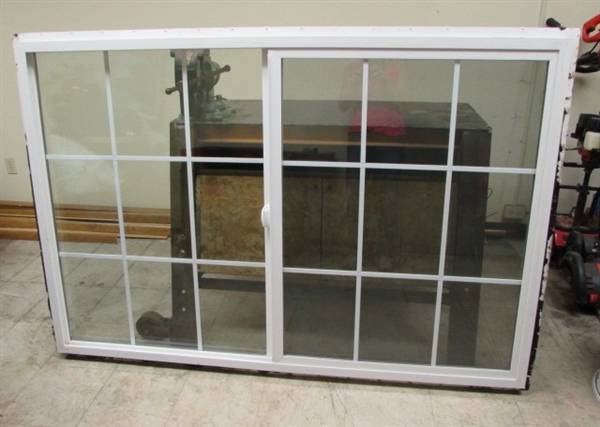 COOL IN THE SUMMER, WARM IN THE WINTER!  BIG VINYL SLIDER WINDOW FOR BETTER ENERGY EFFICIENCY