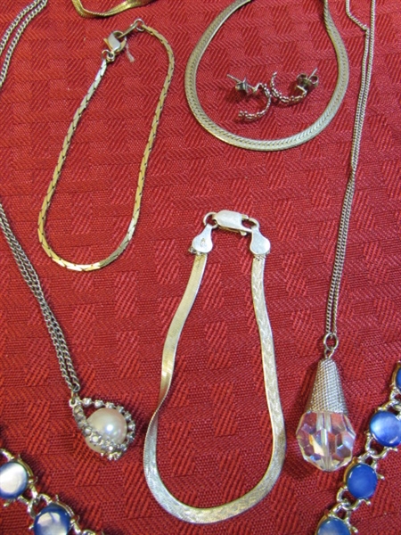 AN ARRAY OF BEAUTIFUL VINTAGE JEWELRY INCLUDING A STERLING SILVER BRACELET, PENDANTS, EARINGS & MORE!