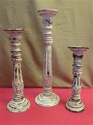 THREE AWESOME OVERSIZED CARVED ANTIQUED WOOD CANDLESTICKS