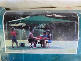 NEVER USED 12 X 12 CANOPY GREAT FOR PICNICS & CAMPING