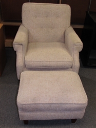 KICK UP YOUR FEET AFTER A HARD DAYS WORK IN THIS SOFT UPHOLSTERED CHAIR WITH FOOTREST