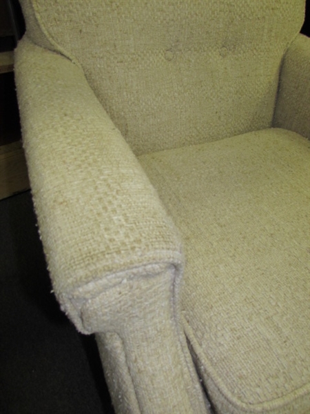 KICK UP YOUR FEET AFTER A HARD DAY'S WORK IN THIS SOFT UPHOLSTERED CHAIR WITH FOOTREST