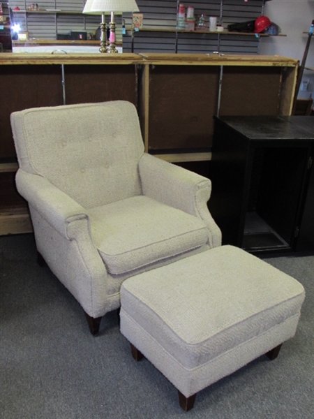 KICK UP YOUR FEET AFTER A HARD DAY'S WORK IN THIS SOFT UPHOLSTERED CHAIR WITH FOOTREST