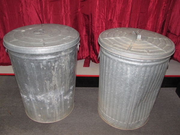 TWO GALVANIZED TRASH CANS WITH LIDS