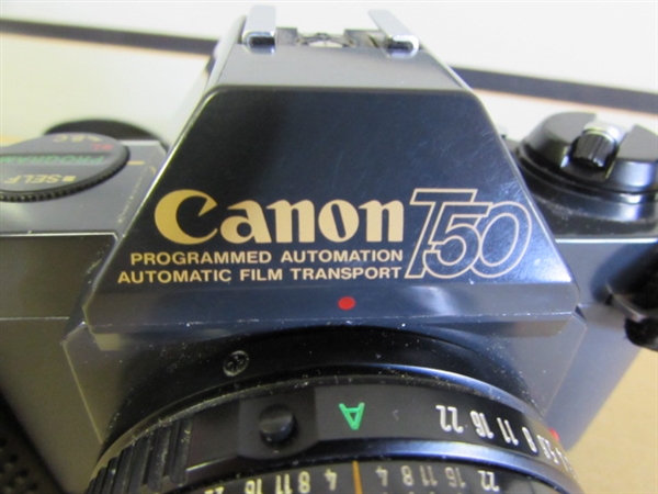 NICE CANON T50 35MM CAMERA WITH 50MM 1:1.8 LENS , AMBICO SKYLIGHT LENS, SHUTTER RELEASE CABLE & MANUAL