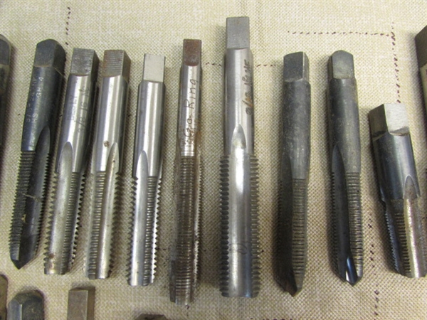 HUGE ASSORTMENT OF OVER 50 TAPS, PRIMARILY BESLY BRAND & A TAP WRENCH