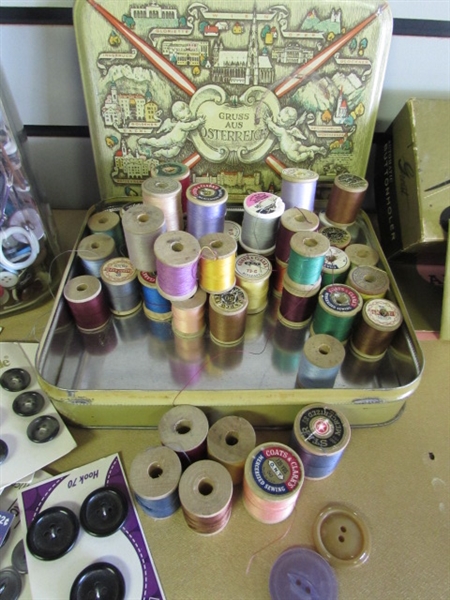 VINTAGE TIN OF SMALL SPOOLS OF THREAD, JAR OF GREAT BUTTONS, GREIST BUTTONHOLER