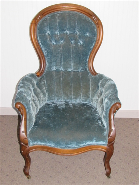 ELEGANTLY CARVED ANTIQUE CHAIR ON CASTERS, MATCHES SOFA