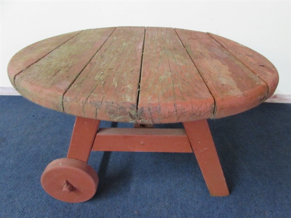 HANDY ROUND WOOD PATIO TABLE ROLLS EASILY TO THE CLOSEST PARTY & AN ATTRACTIVE CERAMIC POT