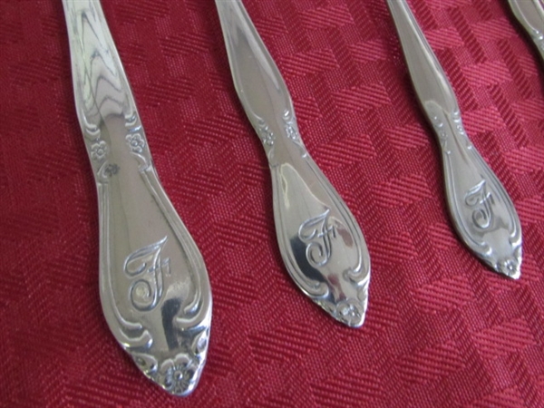 NEW!  EIGHT PLACE SETTINGS OF ELEGANT STAINLESS STEEL FLATWARE
