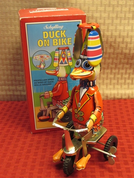 SCHYLLING COLLECTOR SERIES TIN LITHOGRAPH WIND UP DUCK ON BIKE!