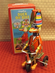 SCHYLLING COLLECTOR SERIES TIN LITHOGRAPH WIND UP DUCK ON BIKE!