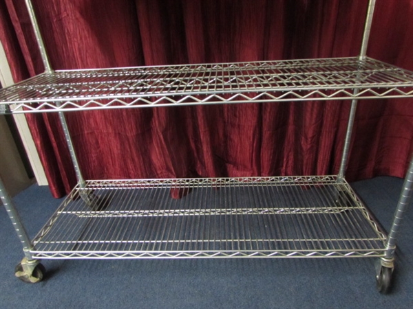 METAL BAKERS RACK WITH PLYWWOD TOP AND CASTOR WHEELS