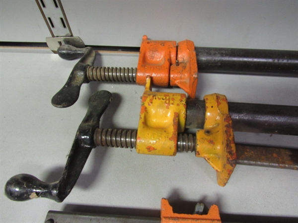 CLAMP IT DONE WITH TWO PIPE CLAMPS, TWO BAR CLAMPS & ONE SQUEEZE CLAMP