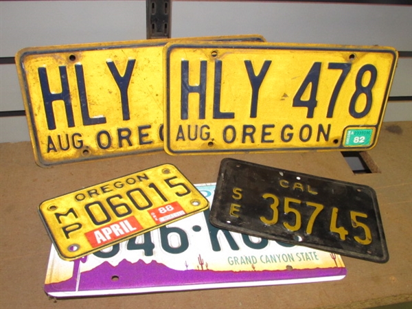 VINTAGE CALIFORNIA YELLOW ON BLACK MOTORCYCLE LICENSE PLATE, PAIR OF OREGON PLATES & MORE