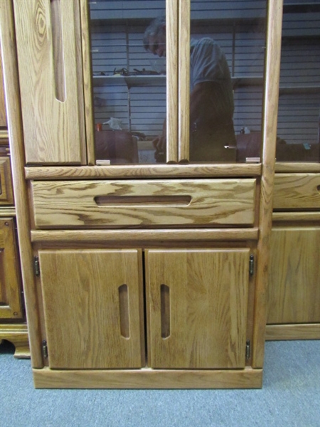 TALL ENCLOSED OAK CABINET WITH GLASS DOORS