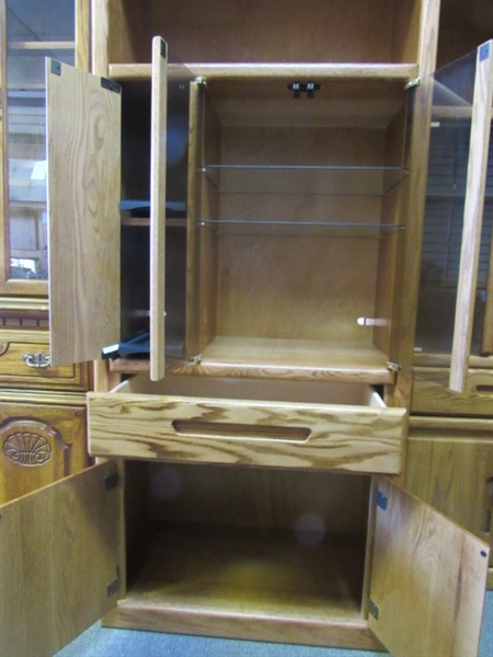 TALL ENCLOSED OAK CABINET WITH GLASS DOORS