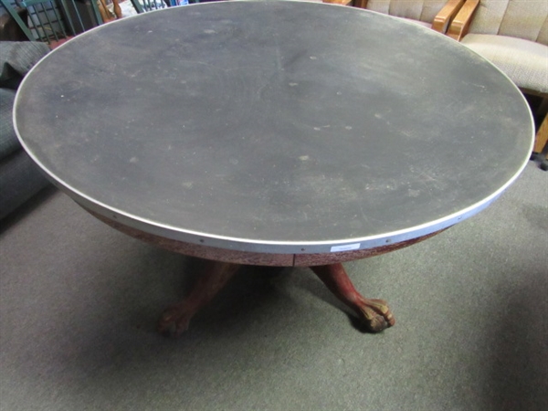 VERY OLD ROUND CLAW & BALL FOOT TABLE WITH METAL REINFORCED EDGE.