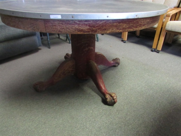 VERY OLD ROUND CLAW & BALL FOOT TABLE WITH METAL REINFORCED EDGE.