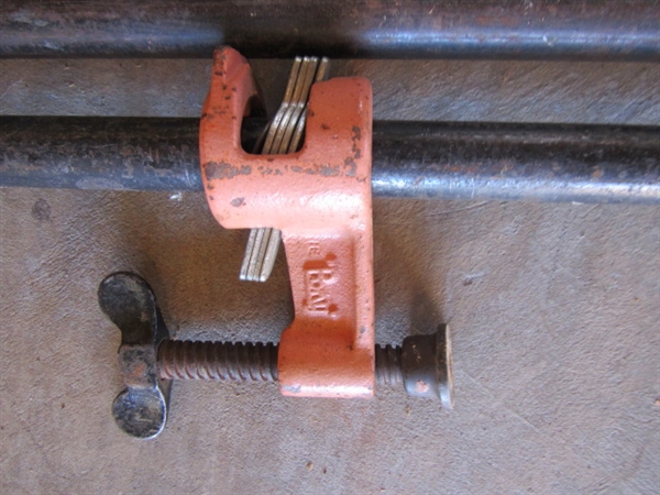 SIX LONG PIPE CLAMPS